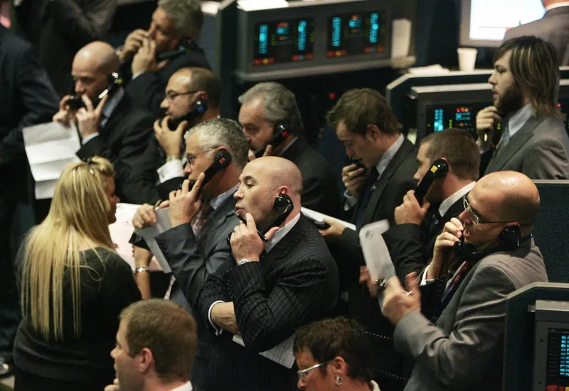 Traders operate in the pit at the London