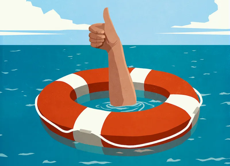 Sinking man below life ring gesturing thumbs up