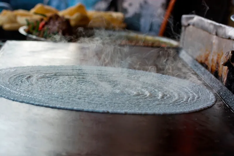 Dosa Being Prepared On Tawa