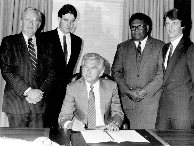 Historical Signing of the treaty of Rarotonga by Mr. Bob Hawke in his office today which makes Australia  a party to the South Pacific Nuclear free zone. LTR. Mr. Bill Hayden, Mr. Robert Tickner, Mr. Bob Hawke, Mr. Epeli Kacimaiwai (high commissioner for