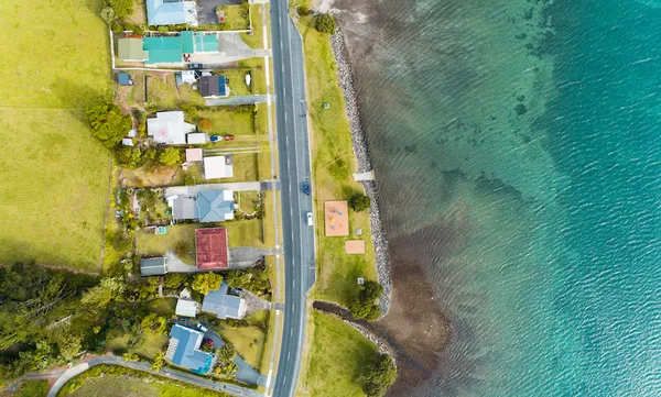 Aerial view of houses on the coast