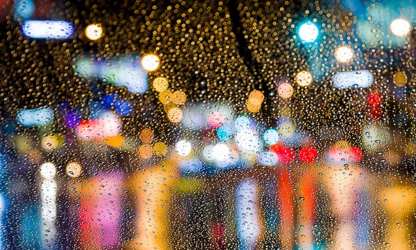 A rainy city street at night