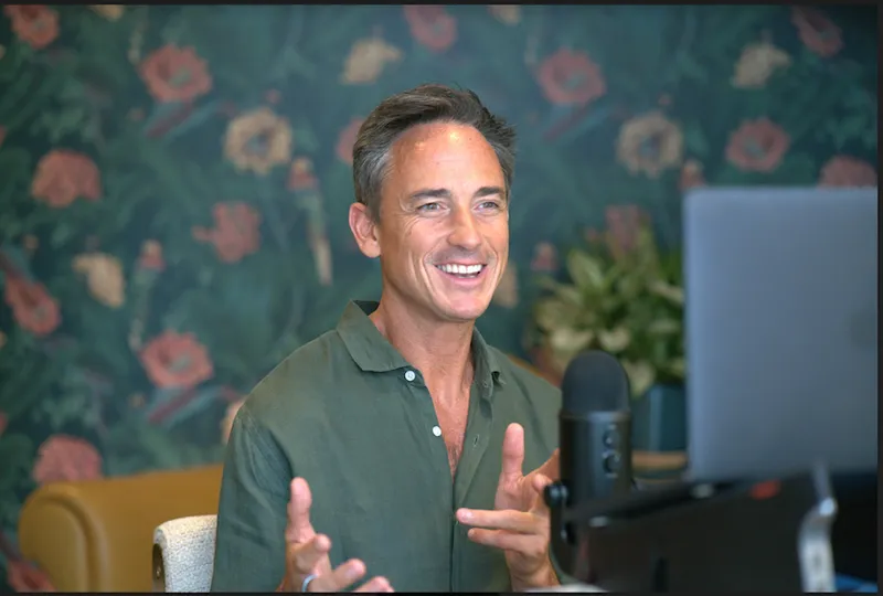 Dom Bowden recording a podcast