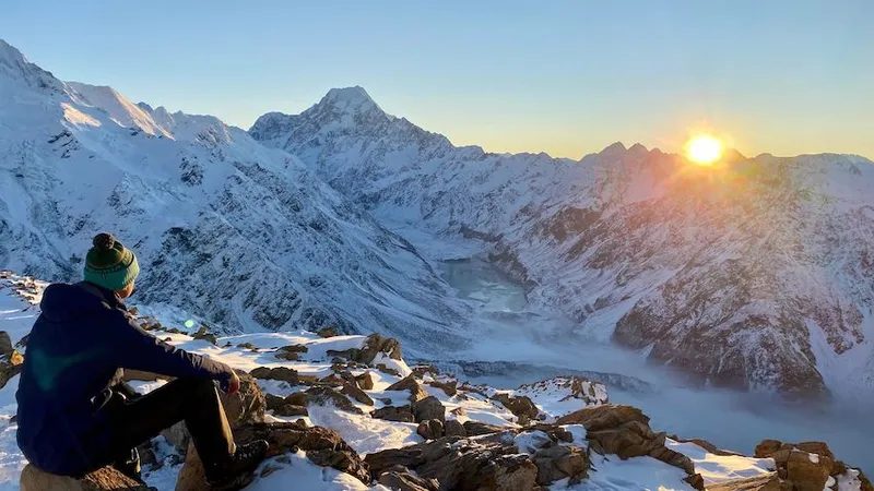 Dom Bowden on a mountain top