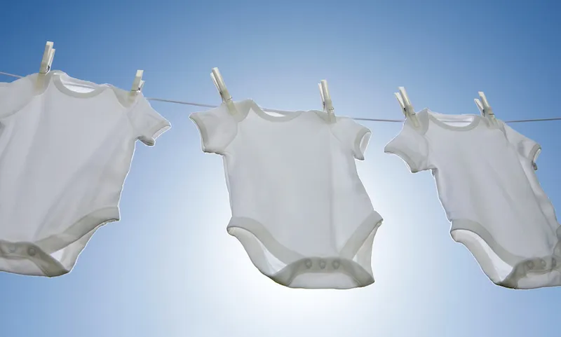 Babygros on a washing line