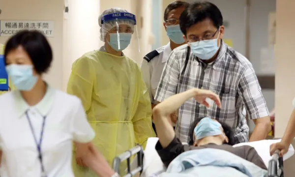 Medical staff in protective outfits as a precaution during a previous Coronavirus outbreak in China