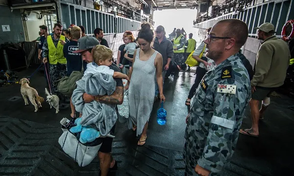 The Royal Australian Navy evacuates people stranded by bushfires in Mallacoota, NSW, 2020