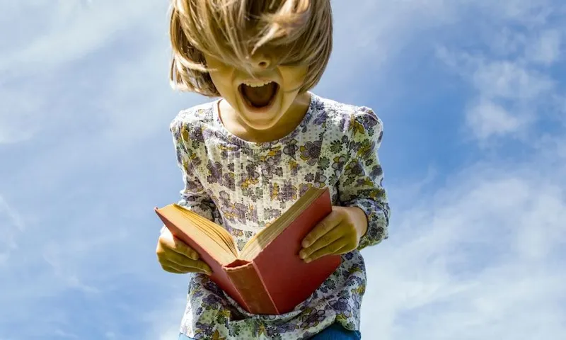 child reading book