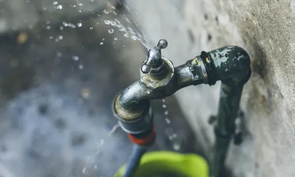 leaking tap water saving getty