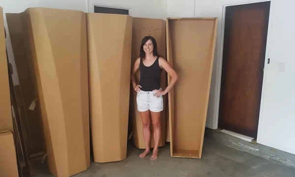 Becs Bartells in her garage with prototypes feature