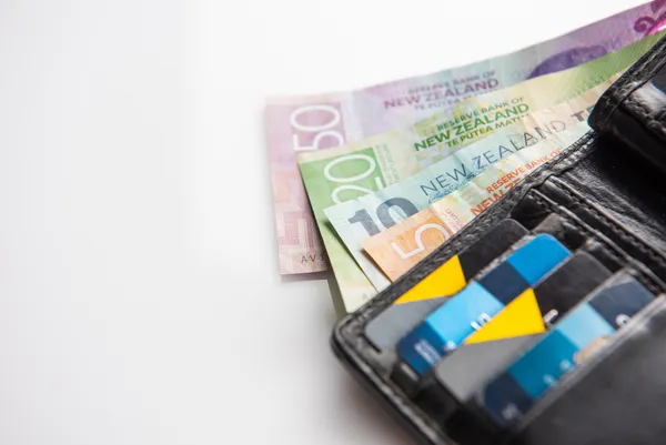 New Zealand dollar banknotes and credit card