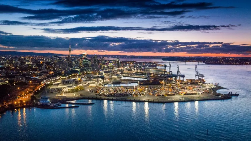 Ports of Auckland and the city at dusk