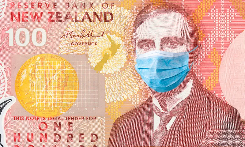 New Zealand quarantine, 100 dollar banknote with medical mask. The concept of epidemic and protection against coronavrius.