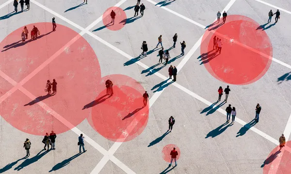 People walking at the town square on a sunny day