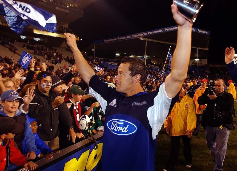 Blues Carlos Spencer celebrates following their wi