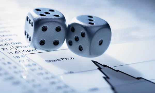 Silver dice on list of share prices