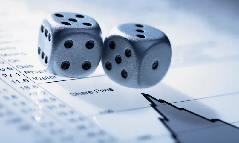 Silver dice on list of share prices