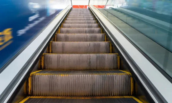 Escalator in Auckland Airport terminal building, New Zealand