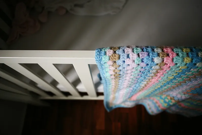 Shadows on baby’s cot