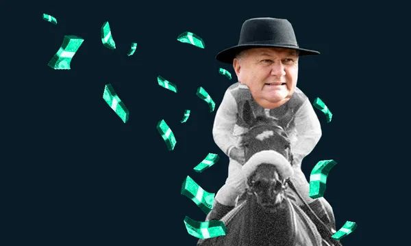 A man with a stern expression is wearing a black hat and riding a horse. Green paper bills are scattered in the air around him against a dark background.