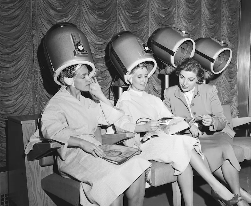 Women Under Hair Dryers