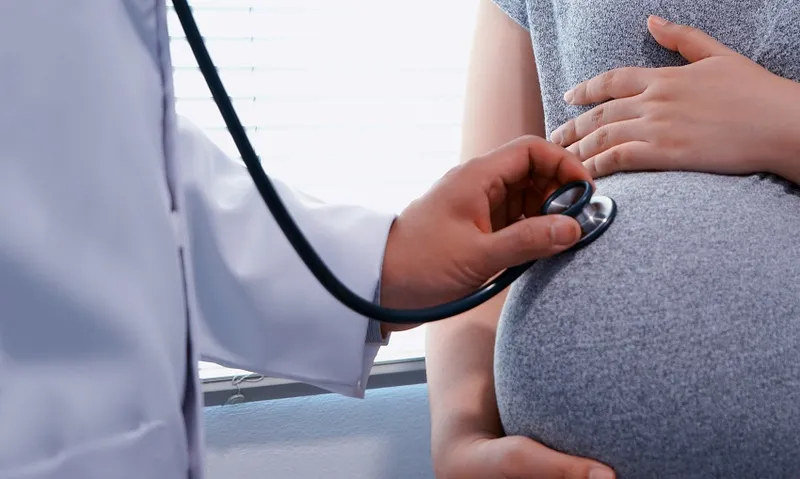 Doctor Examining Pregnant Woman