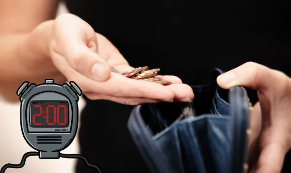 Woman with coins in hand with black leather purse