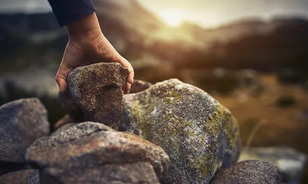 Hiking in the mountains at sunset