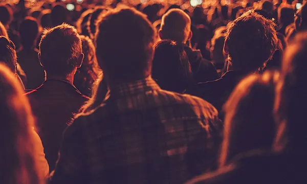 Big concert audience listening to music