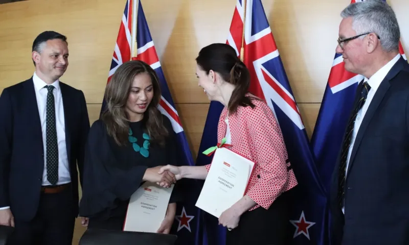 Davidson ardern shaking hands at 2020 agreement signing getty