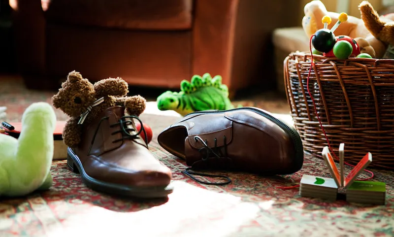 Child’s toys inside adult’s shoes