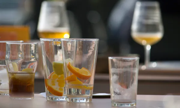 Beer and cocktail glasses on a table