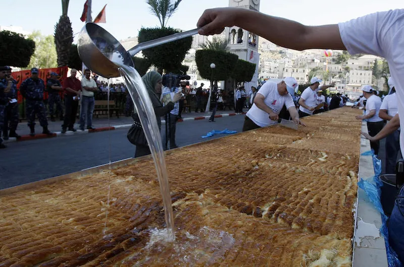 Palestinian confectionery makers add the