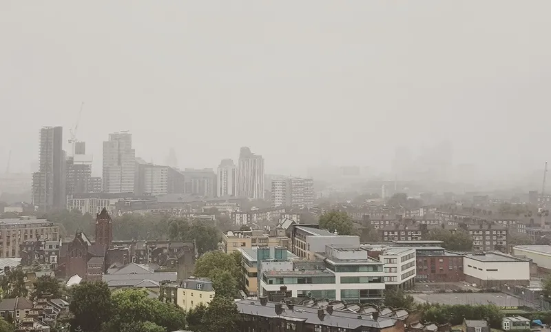 High Angle View Of Buildings In City Against Sky