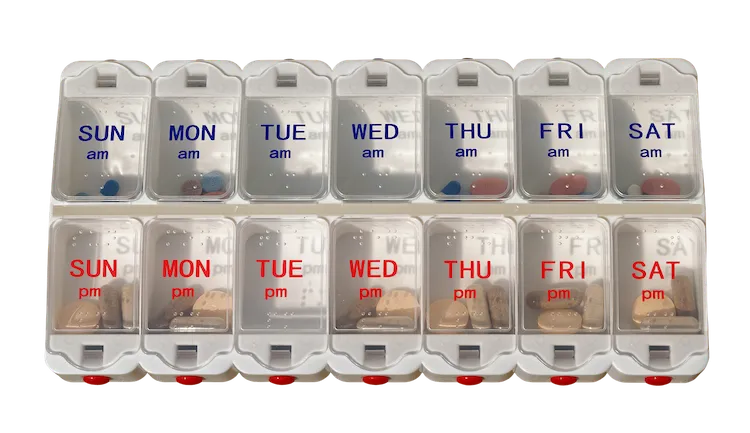 pills-dispenser-966334_1280
