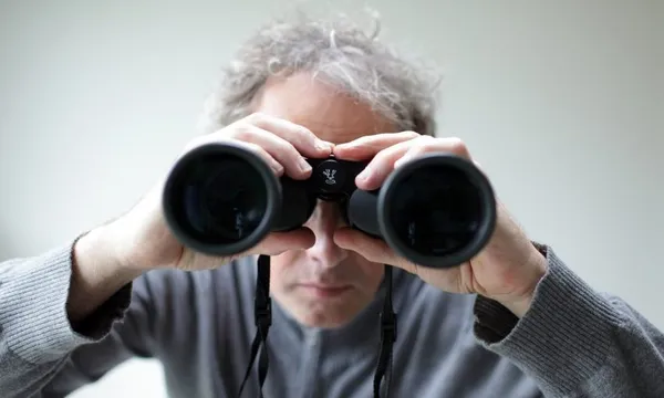 Spying man