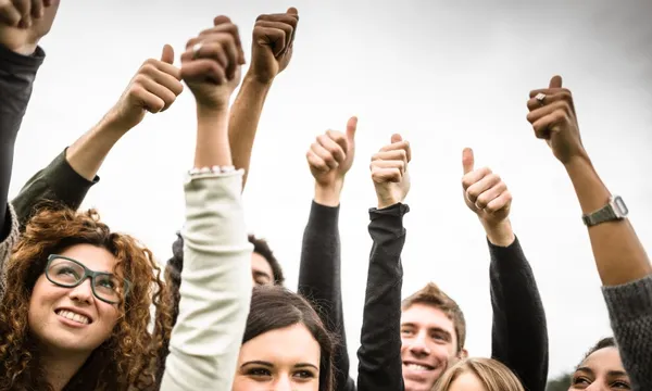 thumbs up young people getty