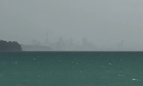 Auckland in stormy mist