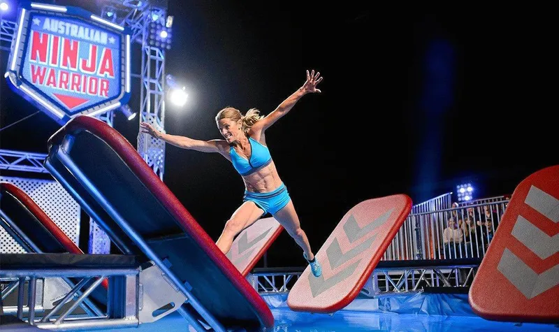 Organiser of the Byron Bay Lighthouse Run Lisa Parkes-Jetha going through her paces on Australia's Ninja Warriors.