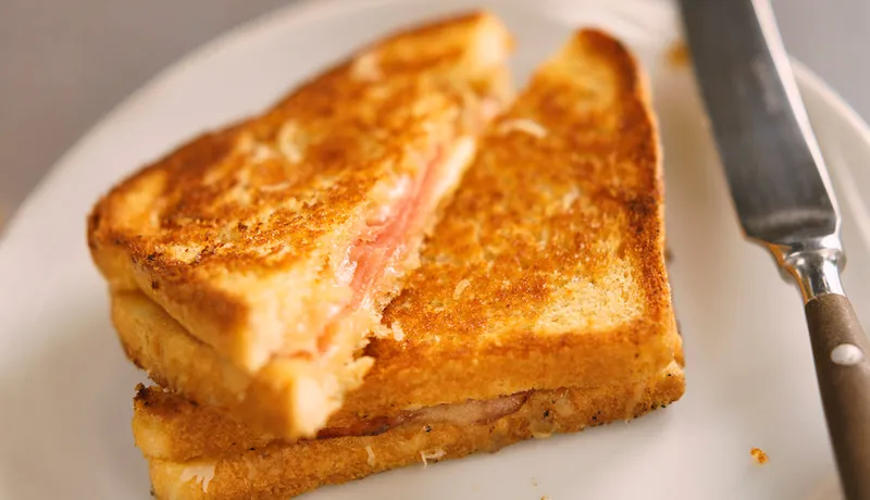 Toasted Ham and Cheese Sandwich on a Plate