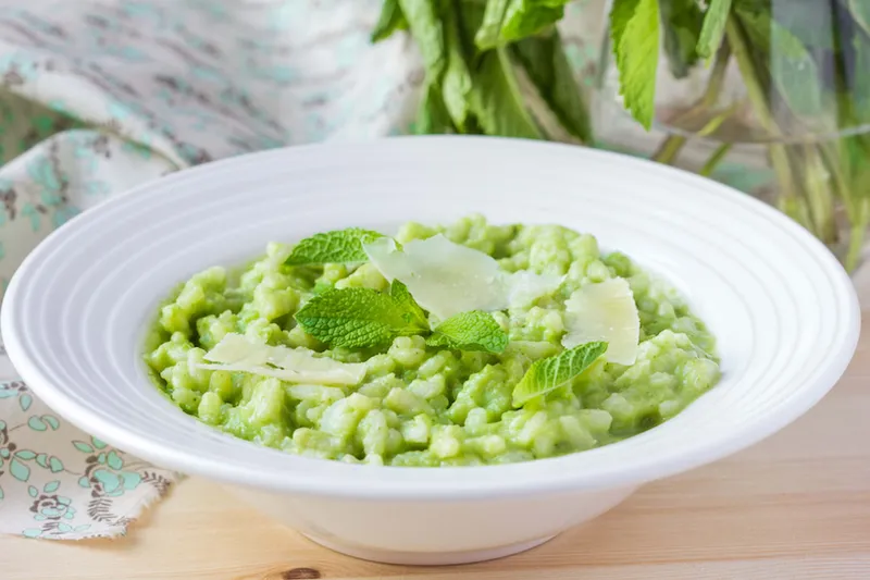 Green Italian risotto with peas, mint, crispy, tasty
