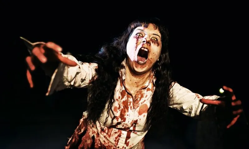 Woman zombie walks at night