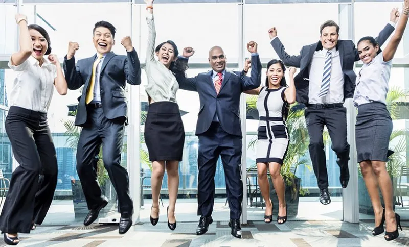 Diversity business team jumping celebrating success