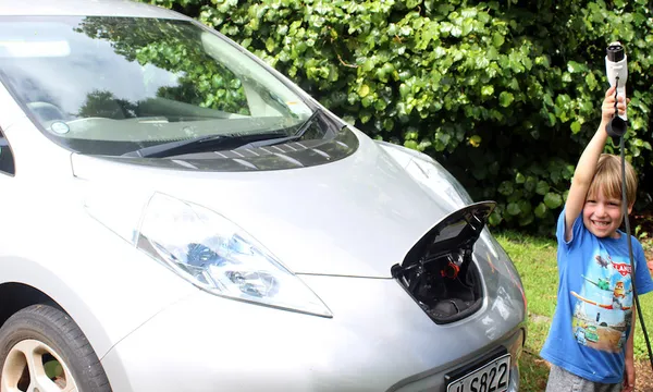 My son helping charge the car (1)