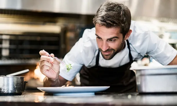 Chef preparing food in a restaurant kitchen