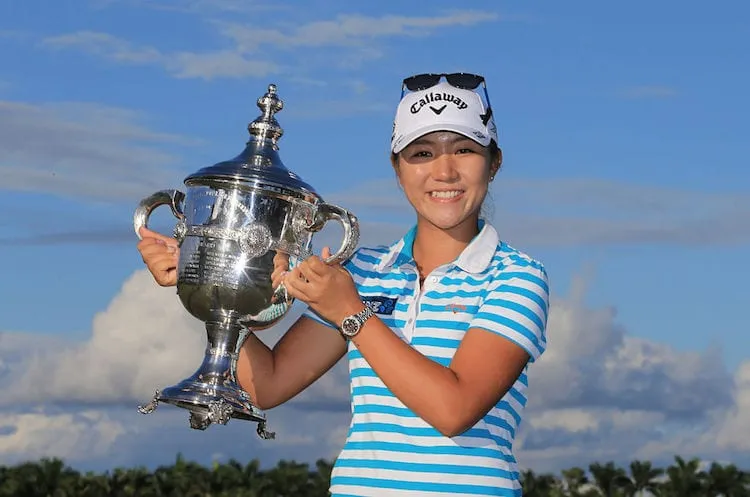 NAPLES, FL - NOVEMBER 22:  Lydia Ko of New Zealand poses with the Rolex Player of the Year trophy following the final round of the CME Group Tour Championship at Tiburon Golf Club on November 22, 2015 in Naples, Florida.  (Photo by Sam Greenwood/Getty Images)