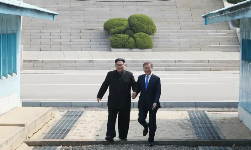 Korean leaders Kim Jong-Un and Moon Jae-in at the DMZ Getty