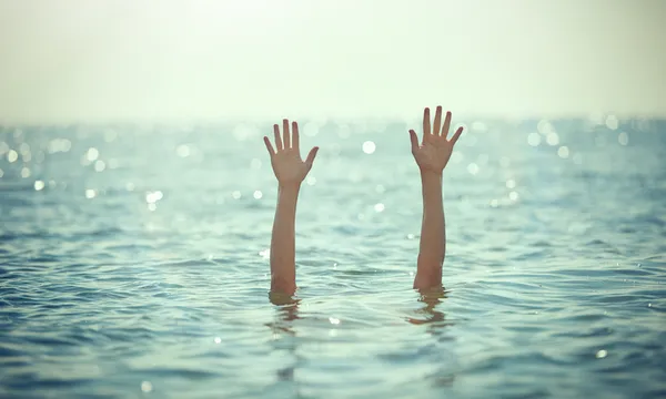 waving for help