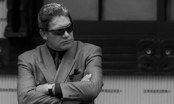 Winston Peters sits outside the Natrional Marae, T