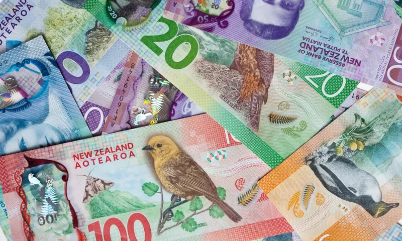 Pile of New Zealand currency laying flat on table